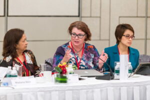 Profile picture of Profeeor Susan Harris Rimmer with two other people