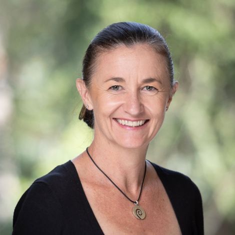 Photo of Dr Sharyn Rundle-Thiele in front of greenery